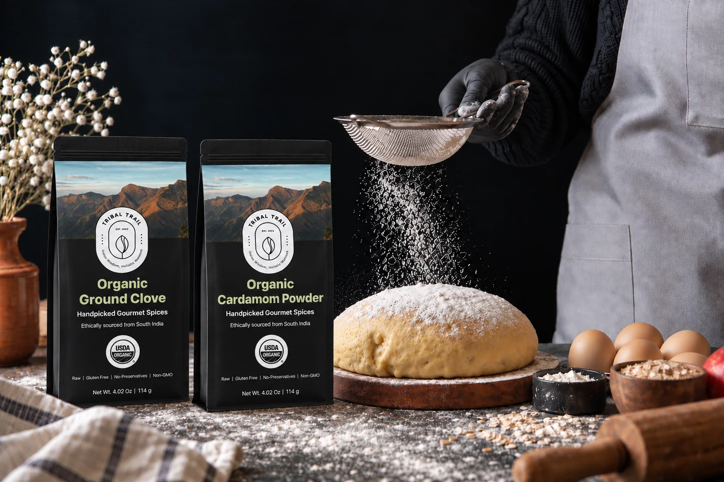 A baker preparing dough with Tribal Trail Ground Clove and Cardamom Powder